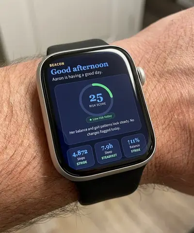 Apple Watch displaying the Haven Beacon dashboard: Risk Score 25, steps, sleep, balance